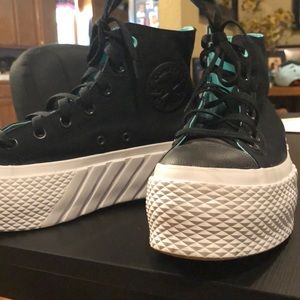 Converse double platform shoes. Excellent condition with very minimal wear.